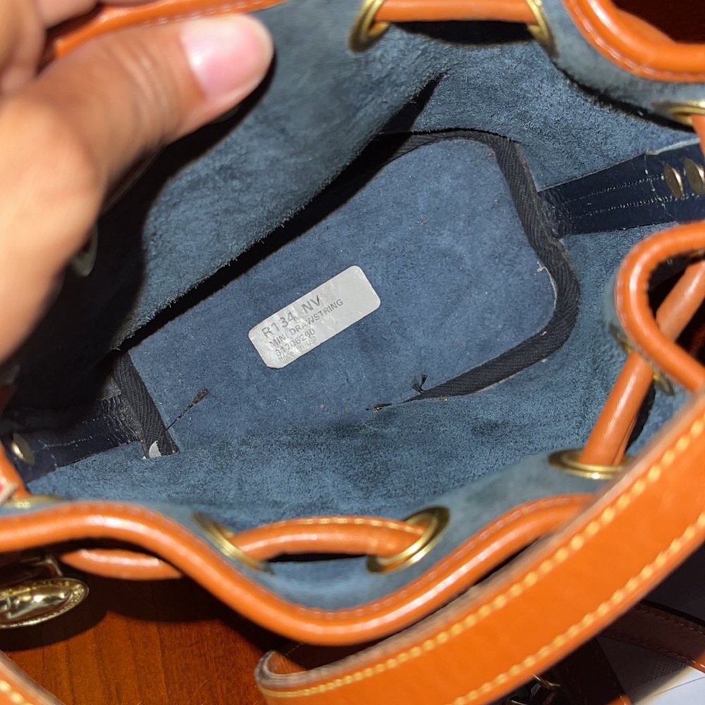 Dooney & Bourke Navy and Tan Pebbled Leather Drawstring Crossbody - Picture 5 of 9